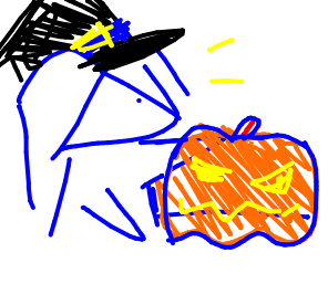 Meis wearing a witch hat and holding a jack-o-lantern.
